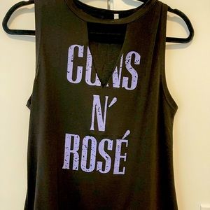 Graphic tank top with cut out. Size medium. Never worn